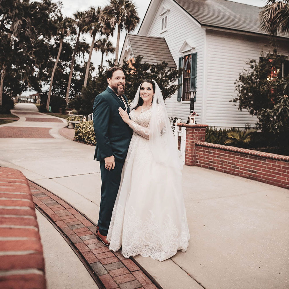 bride in wedding dress and groom in tuxedo